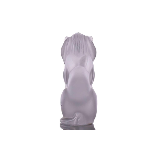 236 - A Lalique 'Bamara' frosted glass sculpture of a lion seat on his haunches. 20 cm high x 17 cm long x... 