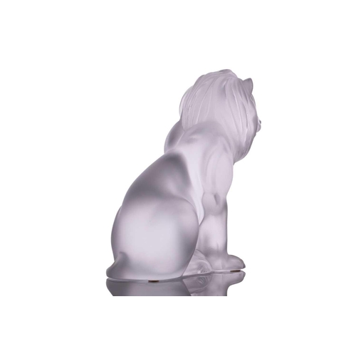 236 - A Lalique 'Bamara' frosted glass sculpture of a lion seat on his haunches. 20 cm high x 17 cm long x... 