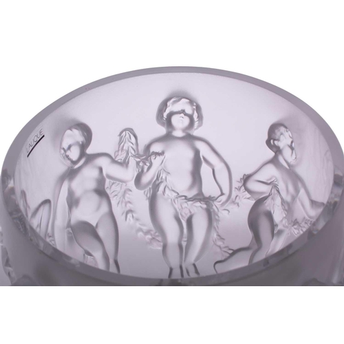 237 - A Lalique 'Luxembourg' centre bowl moulded with cherubs holding swags of flowers. 32 cm overall widt... 