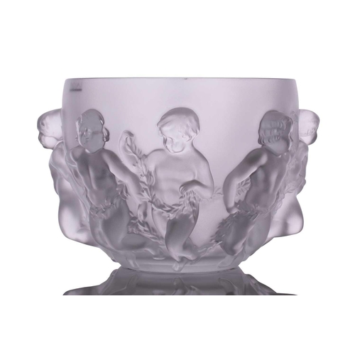 237 - A Lalique 'Luxembourg' centre bowl moulded with cherubs holding swags of flowers. 32 cm overall widt... 