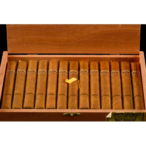 239 - A sealed box of 25 H. Upmann Coronas Major cigars, an opened box of 23 H. Upmann Coronas major cigar... 