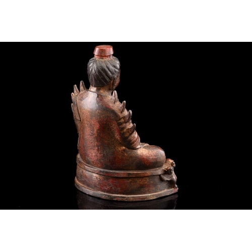 64 - A Chinese Northern Wei style figure of Shakyamuni Buddha, seated in dhyana mudra, wearing long robes... 