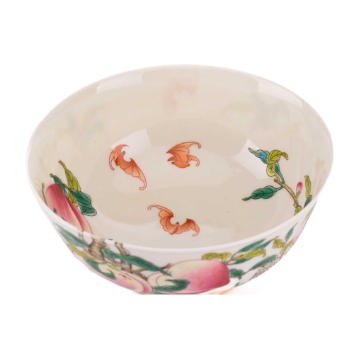 84 - Two Chinese porcelain bowls, one decorated to the exterior with two birds on rockwork eyeing a fruit... 