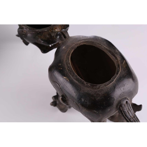 97 - A Chinese Pixiu patinated bronze censer with open mouth and hinged head,17 cm long x 25 cm high; tog... 