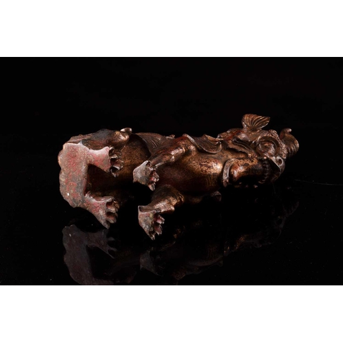 99 - A Chinese bronze censer in the form of an obese Pixiu, with scrolling mane and short tail, with flam... 