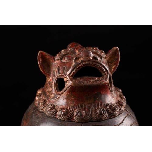 99 - A Chinese bronze censer in the form of an obese Pixiu, with scrolling mane and short tail, with flam... 