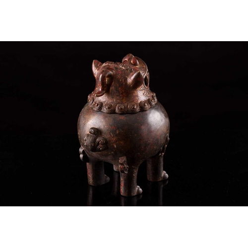 99 - A Chinese bronze censer in the form of an obese Pixiu, with scrolling mane and short tail, with flam... 