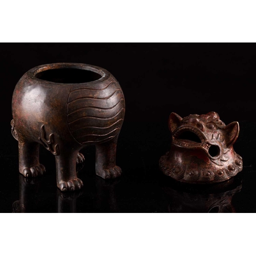 99 - A Chinese bronze censer in the form of an obese Pixiu, with scrolling mane and short tail, with flam... 