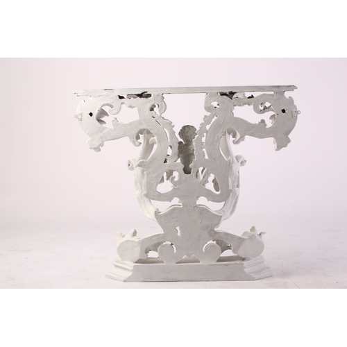 109 - An impressive white-painted and carved composition Baroque console table and wall mirror with a prof... 