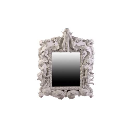 109 - An impressive white-painted and carved composition Baroque console table and wall mirror with a prof... 