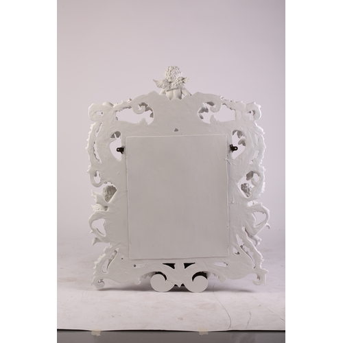 109 - An impressive white-painted and carved composition Baroque console table and wall mirror with a prof... 