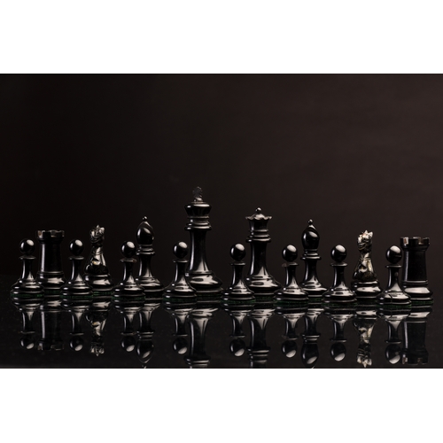 201A - A Staunton chess boxwood and ebony set, in an original box with paper label, the Kings 9.5 cm high, ... 