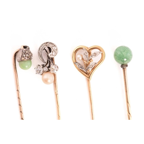 27 - Four gem-set stick pins; A heart-shaped stick pin with foliate details and pearl highlight, French e... 