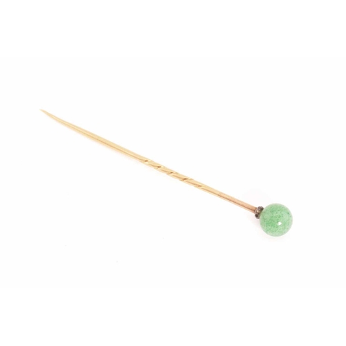 27 - Four gem-set stick pins; A heart-shaped stick pin with foliate details and pearl highlight, French e... 