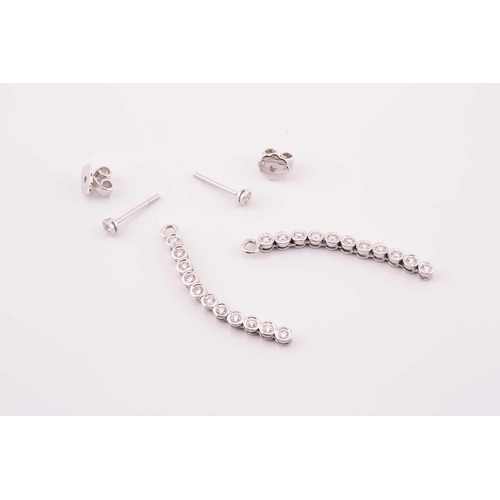 31 - A pair of diamond line drop earrings, each has a dangling enhancing part detachable from the studs, ... 