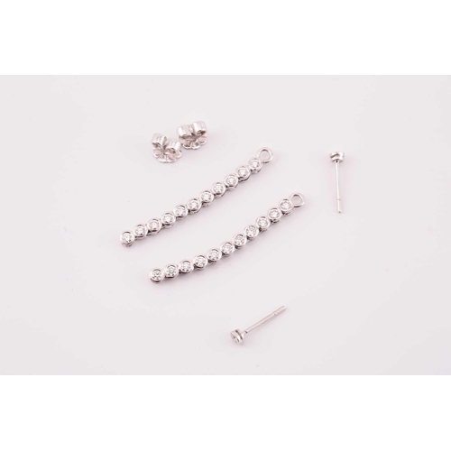 31 - A pair of diamond line drop earrings, each has a dangling enhancing part detachable from the studs, ... 