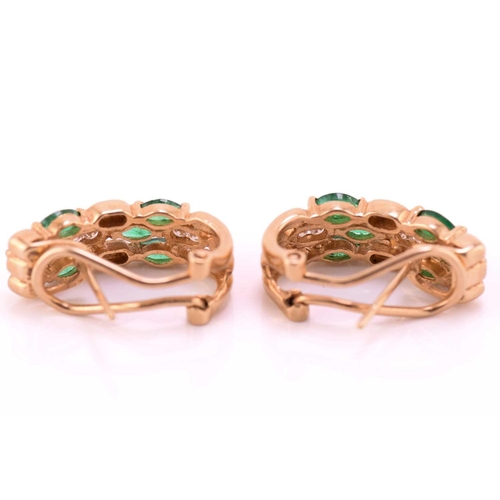 44 - A pair of emerald and diamond earrings, each comprises six marquise-shaped emeralds and four brillia... 