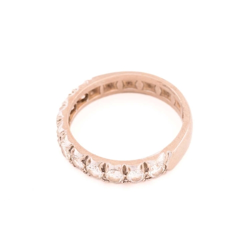 50 - A diamond half eternity ring, comprises ten brilliant-cut diamonds with the size of 3.0 mm, pavé set... 