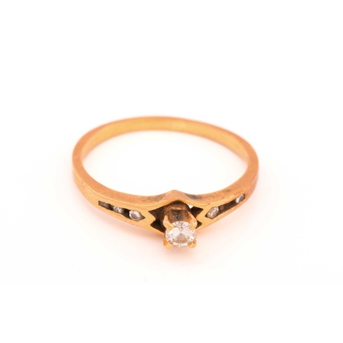 59 - A three-piece diamond ring set in 18ct gold, consisting of a diamond solitaire ring in a high-profil... 