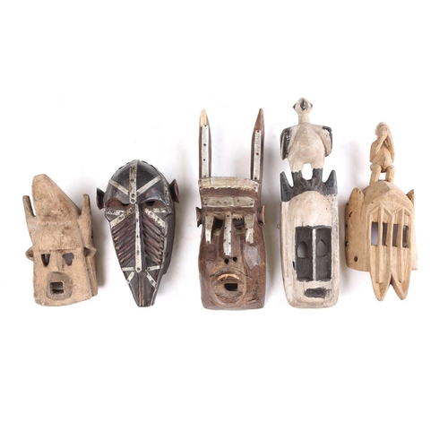 102 - Two Marka masks, Mali, each of zoomorphic form, with applied strips of aluminium, the monkey form ma... 
