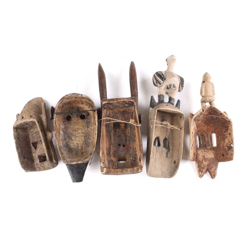 102 - Two Marka masks, Mali, each of zoomorphic form, with applied strips of aluminium, the monkey form ma... 