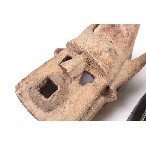 102 - Two Marka masks, Mali, each of zoomorphic form, with applied strips of aluminium, the monkey form ma... 