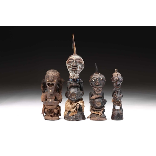 103 - Four Songye power figures, Nikisi, Democratic Republic of Congo, three with animal horn charge, with... 