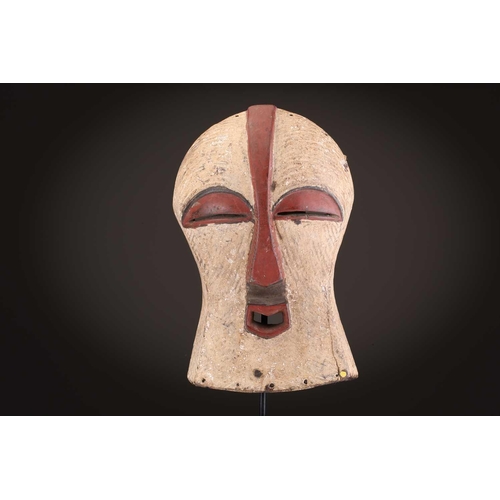 105 - Three Luba Bilume kifwebe, Democratic Republic of Congo, a hardwood example with incised linear deco... 