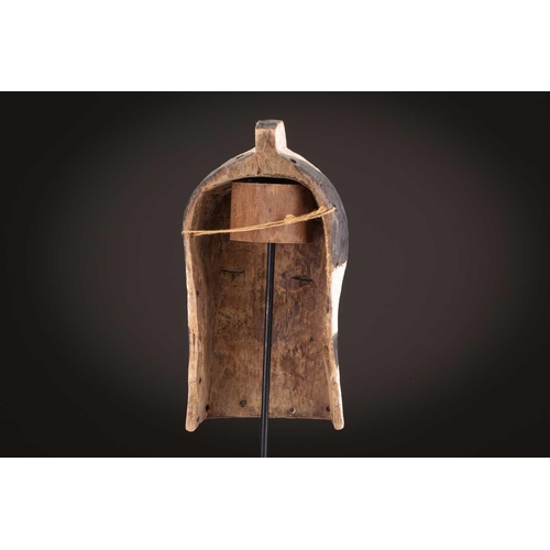 105 - Three Luba Bilume kifwebe, Democratic Republic of Congo, a hardwood example with incised linear deco... 