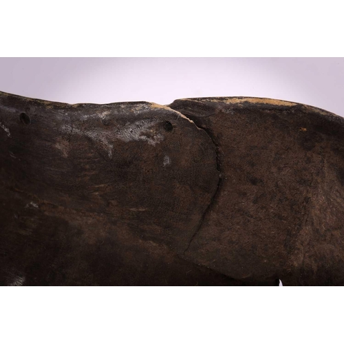 105 - Three Luba Bilume kifwebe, Democratic Republic of Congo, a hardwood example with incised linear deco... 