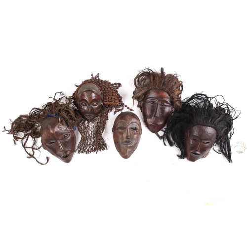 111 - A Tchokwe Pwo mask, Angola, with cross hatched coiffure, with facial scarifications, the pierced sid... 