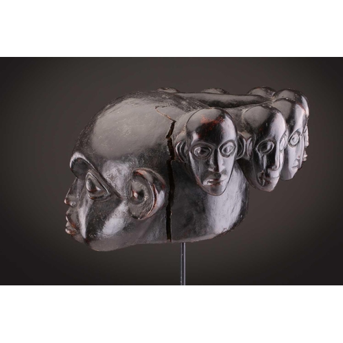 112 - A Mambila zoomorphic headdress mask, Cameroon, covered in animal skin, with wood teeth and red pigme... 