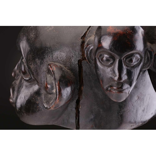 112 - A Mambila zoomorphic headdress mask, Cameroon, covered in animal skin, with wood teeth and red pigme... 