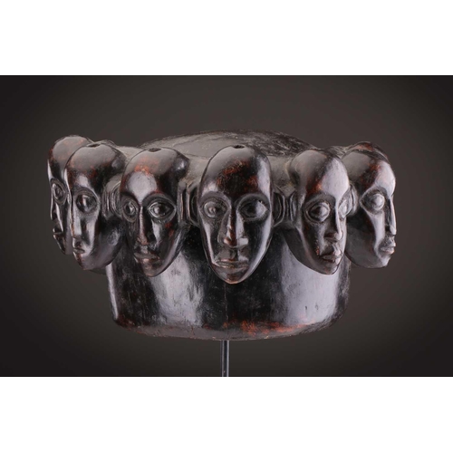112 - A Mambila zoomorphic headdress mask, Cameroon, covered in animal skin, with wood teeth and red pigme... 