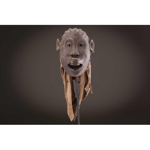 118 - A Lombi mask, Democratic Republic of Congo, the eye sockets painted with thick white pigment, 40cm, ... 