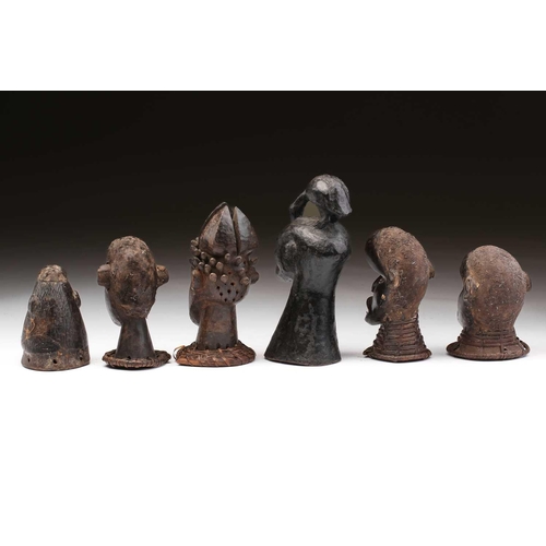 119 - Five Ekoi anthropomorphic head crests, Nigeria, four with applied hair, and a solid head crest with ... 
