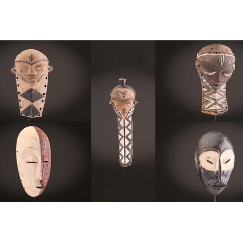 61 - Three Zimba masks, Democratic Republic of Congo, painted in coloured pigments, 29.5cm - 42.5cm; and ... 
