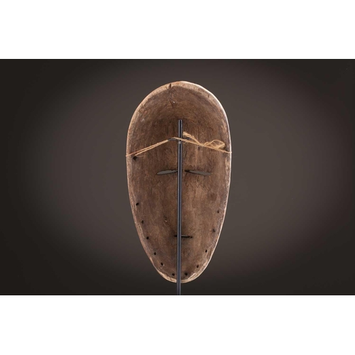 61 - Three Zimba masks, Democratic Republic of Congo, painted in coloured pigments, 29.5cm - 42.5cm; and ... 