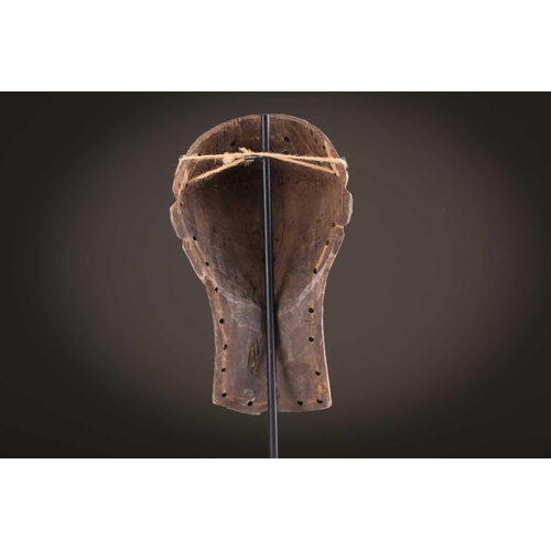 61 - Three Zimba masks, Democratic Republic of Congo, painted in coloured pigments, 29.5cm - 42.5cm; and ... 