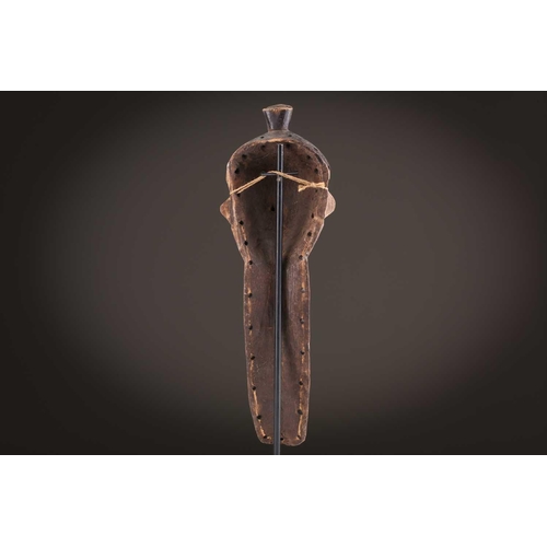 61 - Three Zimba masks, Democratic Republic of Congo, painted in coloured pigments, 29.5cm - 42.5cm; and ... 
