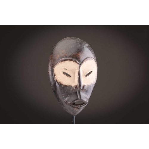 61 - Three Zimba masks, Democratic Republic of Congo, painted in coloured pigments, 29.5cm - 42.5cm; and ... 