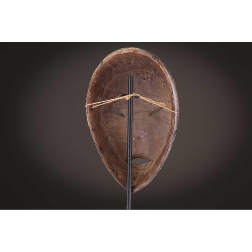 61 - Three Zimba masks, Democratic Republic of Congo, painted in coloured pigments, 29.5cm - 42.5cm; and ... 