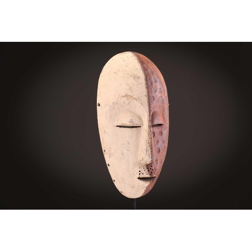 61 - Three Zimba masks, Democratic Republic of Congo, painted in coloured pigments, 29.5cm - 42.5cm; and ... 