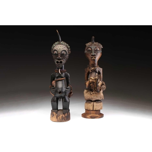 62 - Two Songye community power figures, Mankisi, with horn charge and embedded metal blades to the head,... 
