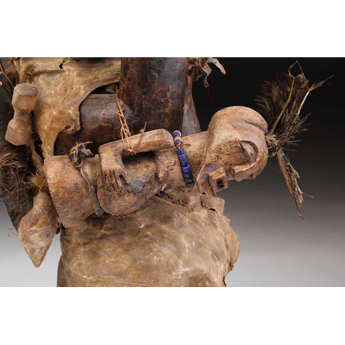 62 - Two Songye community power figures, Mankisi, with horn charge and embedded metal blades to the head,... 