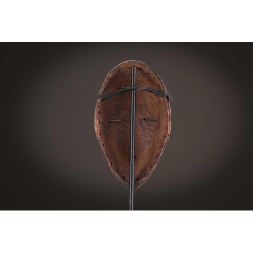 65 - A group of nine Dan masks, Liberia, to include two bird masks and three passport masks, 12.5cm - 32c... 