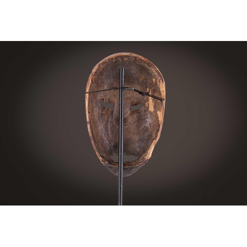 65 - A group of nine Dan masks, Liberia, to include two bird masks and three passport masks, 12.5cm - 32c... 