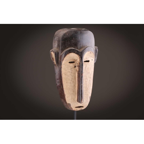 65 - A group of nine Dan masks, Liberia, to include two bird masks and three passport masks, 12.5cm - 32c... 