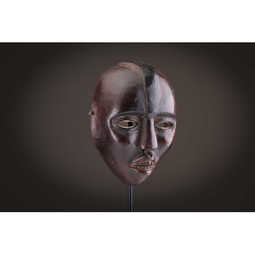 65 - A group of nine Dan masks, Liberia, to include two bird masks and three passport masks, 12.5cm - 32c... 