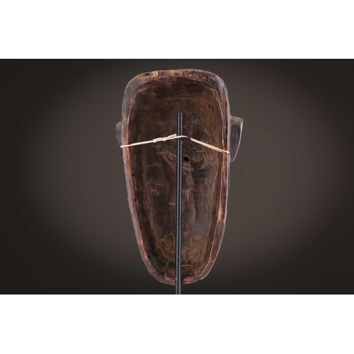 65 - A group of nine Dan masks, Liberia, to include two bird masks and three passport masks, 12.5cm - 32c... 
